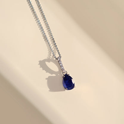 Blue Sapphire Necklace Sway - silver flat lay