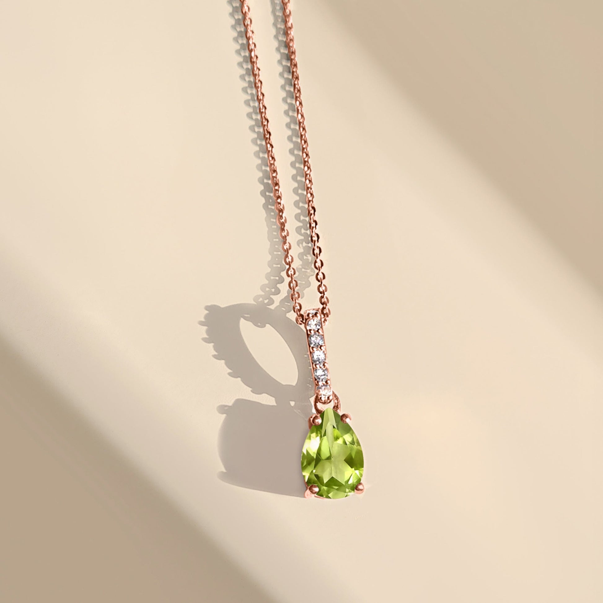 Peridot Necklace Sway - rose gold flat lay