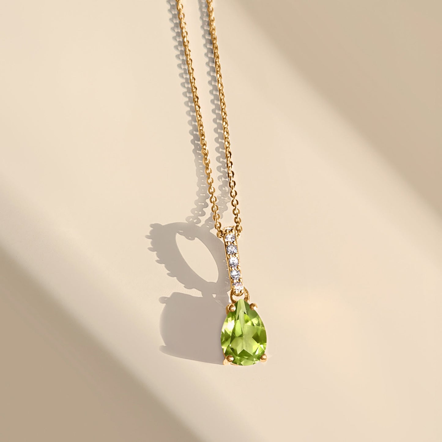 Peridot Necklace Sway - yellow gold flat lay