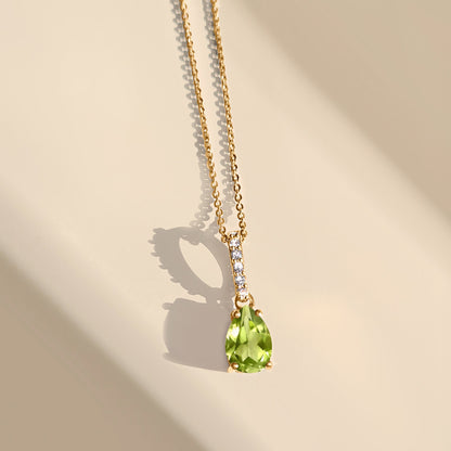 Peridot Necklace Sway - yellow gold flat lay