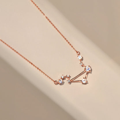 Libra necklace rose gold flat lay