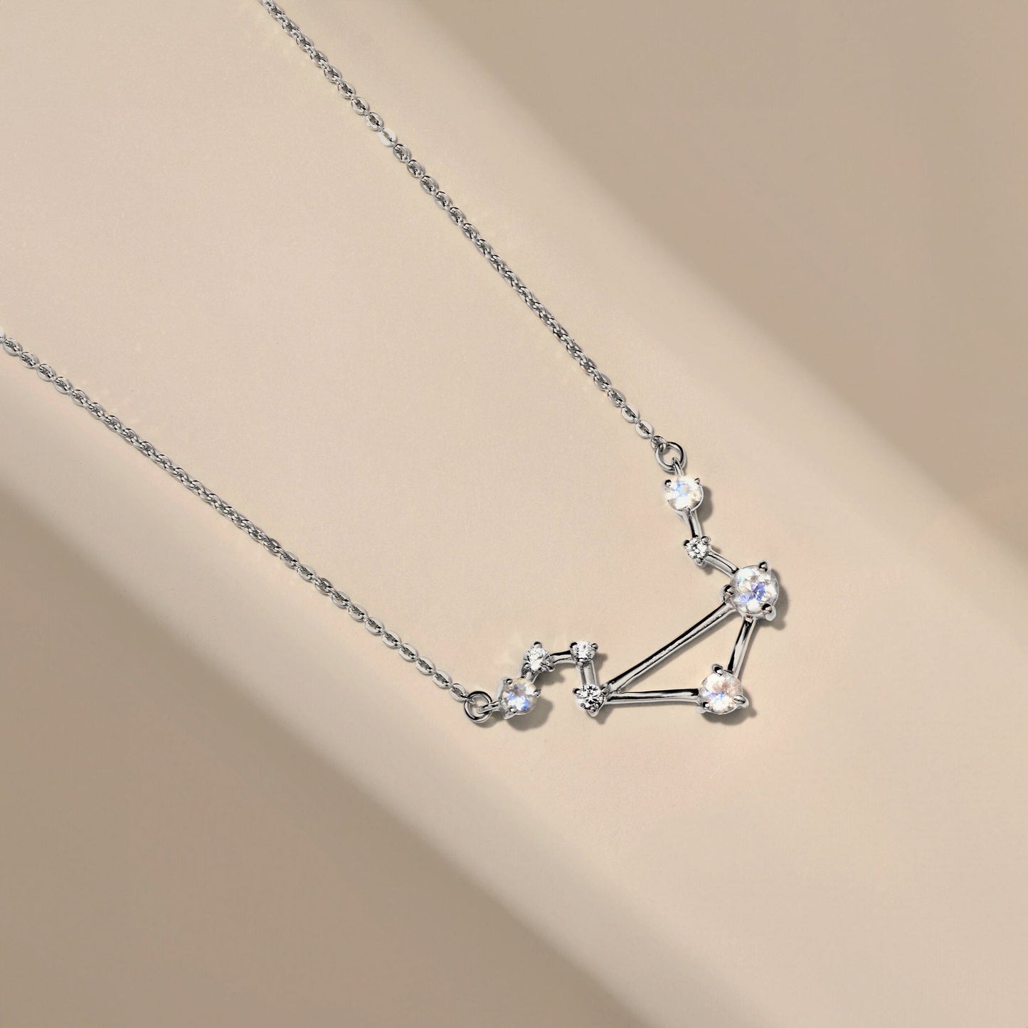 Libra necklace silver flat lay
