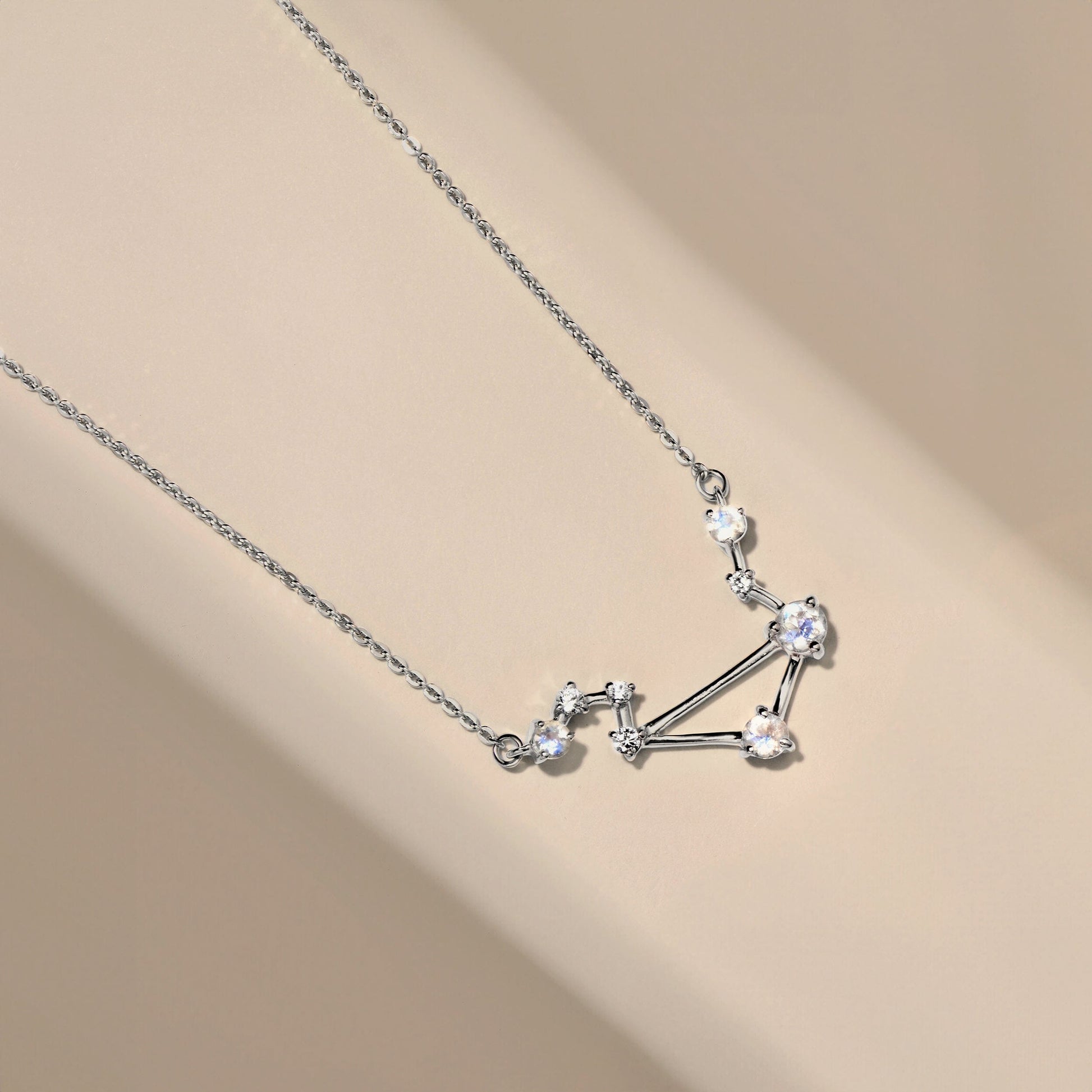 Libra necklace silver flat lay