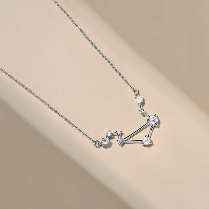 Libra necklace silver flat lay