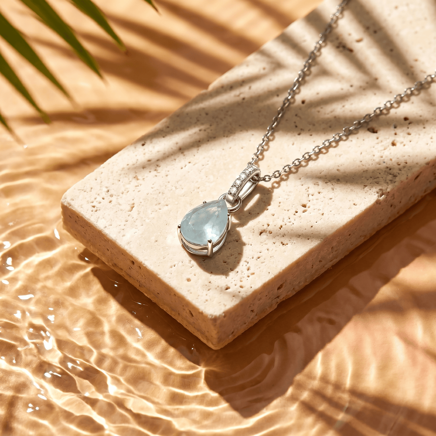 Aquamarine Necklace Sway - March Birthstone - silver flat lay