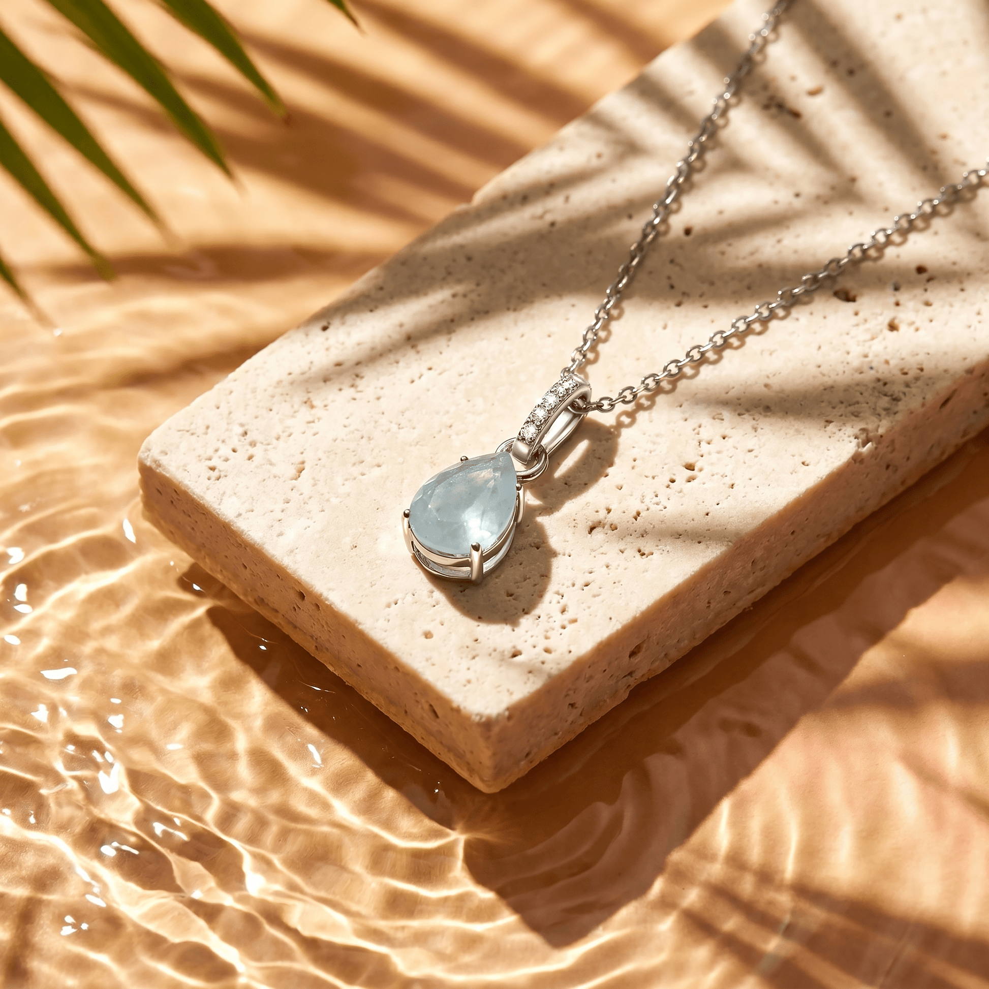 Aquamarine Necklace Sway - March Birthstone - silver flat lay