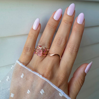 Rose Quartz Flow & Ruby Stardust & Waves Rings, rose gold on hand
