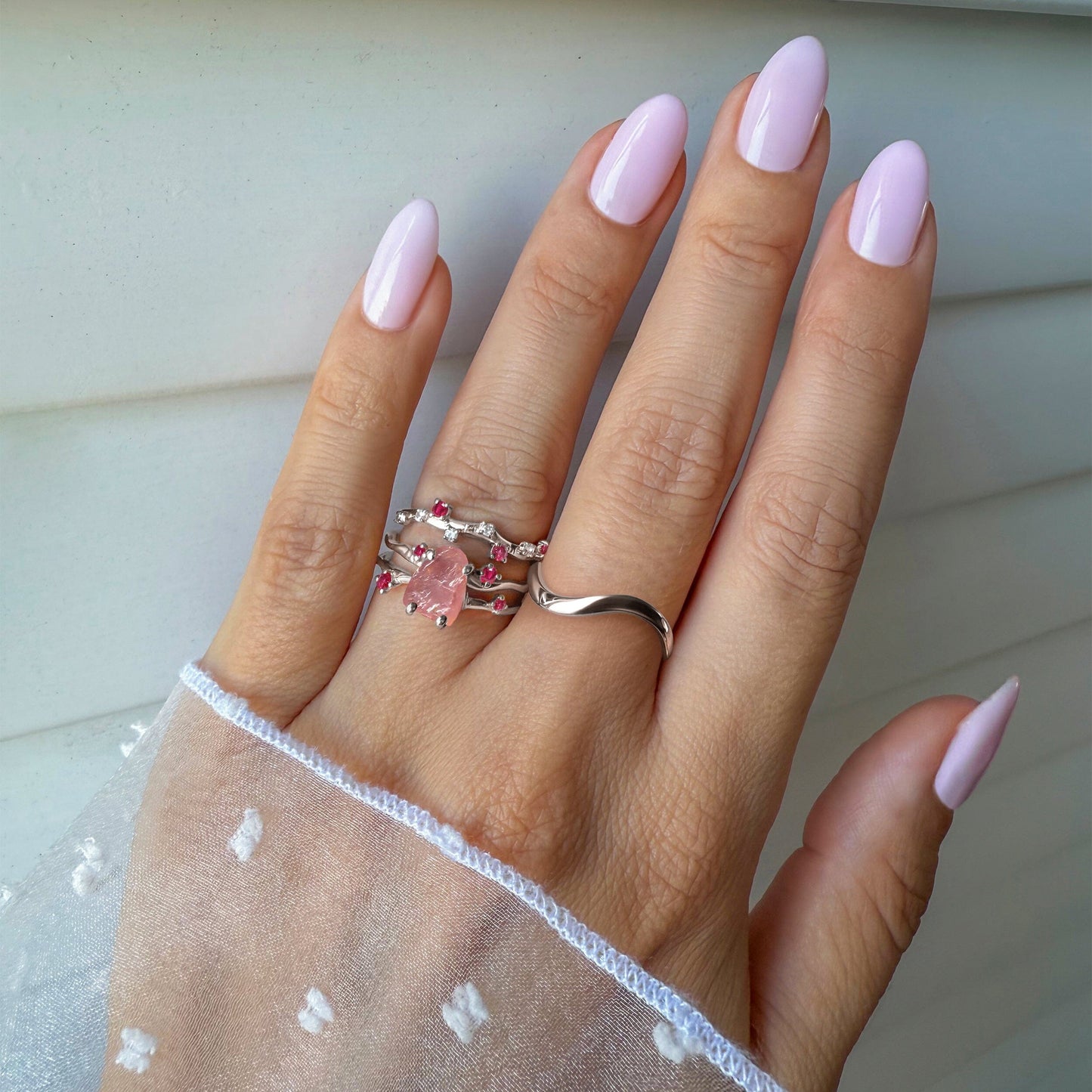 Rose Quartz Flow & Ruby Stardust & Waves Rings, silver on hand