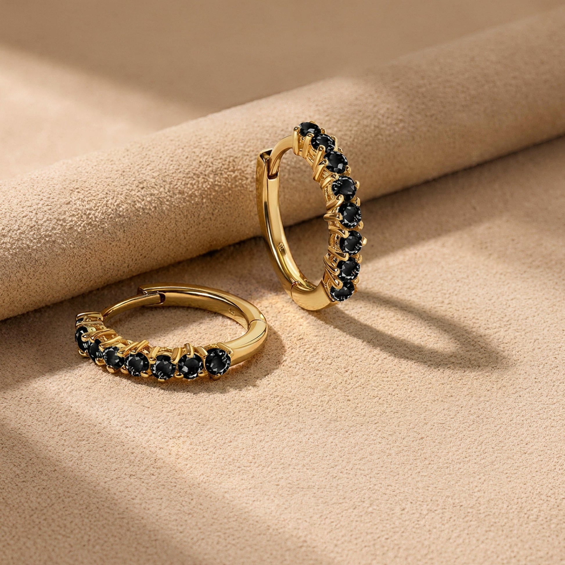 Black Onyx Earrings - Queen Bonny Hoops flat lay