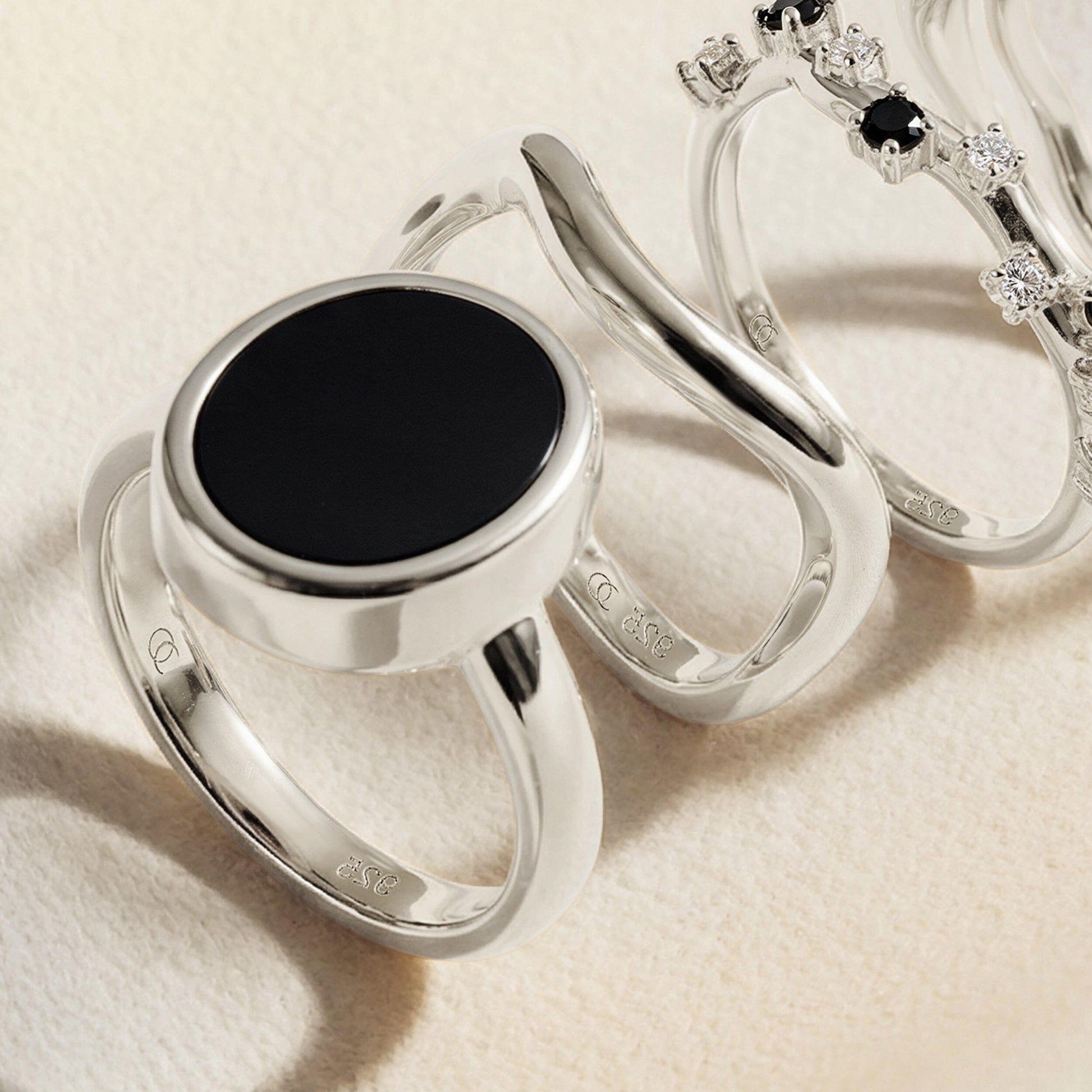 Black Onyx Ring Enfolded silver flatlay