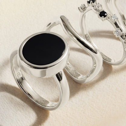 Black Onyx Ring Enfolded silver flatlay