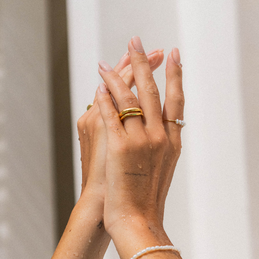 Gemini rings worn, hands