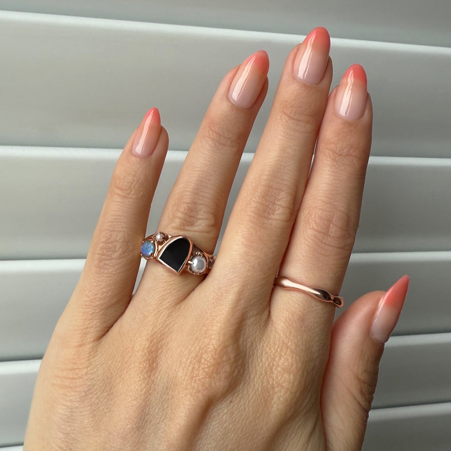 Black Obsidian Heirloom ring detail on hand - rose gold