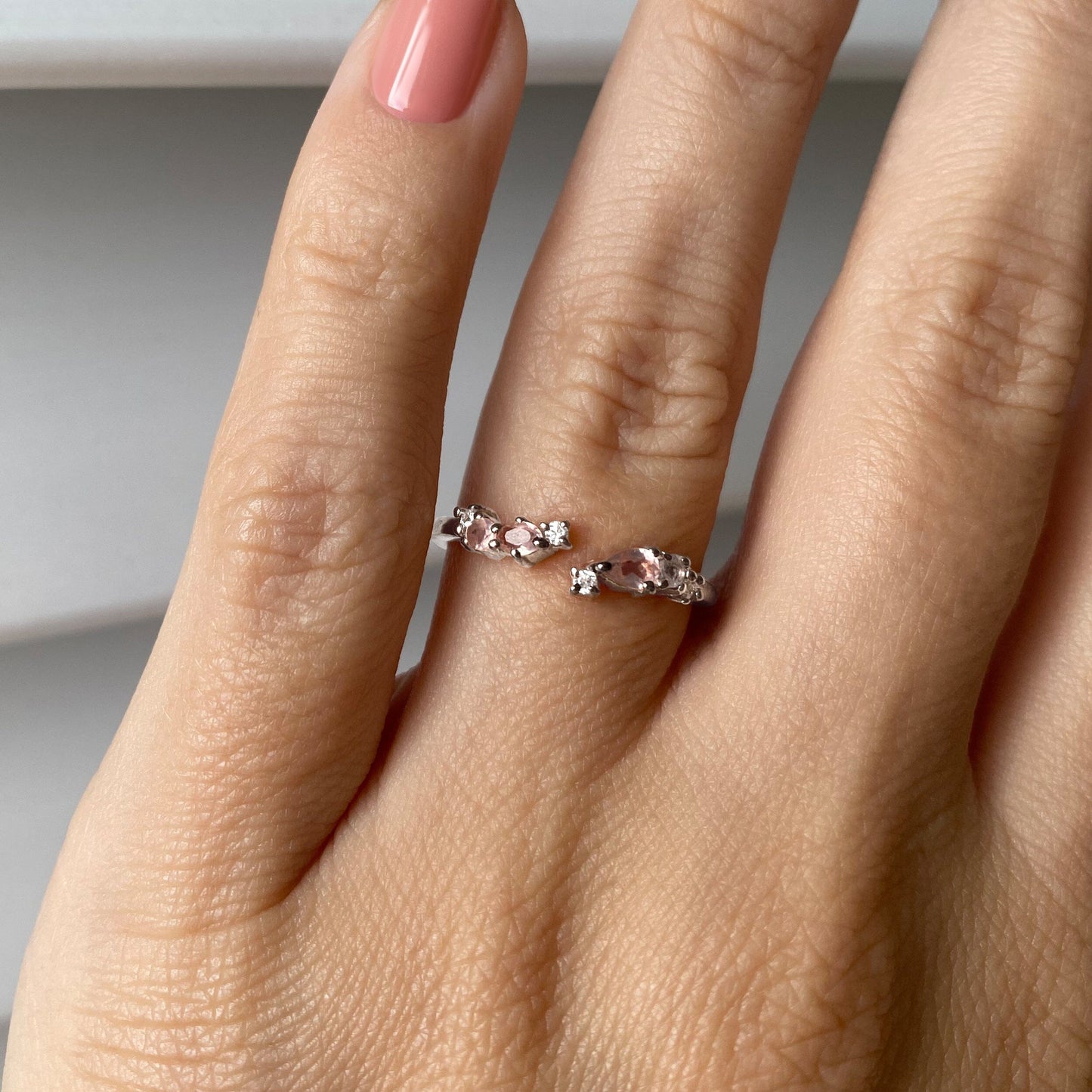 Adjustable Rose Quartz Ring - Flourish, silver on hand