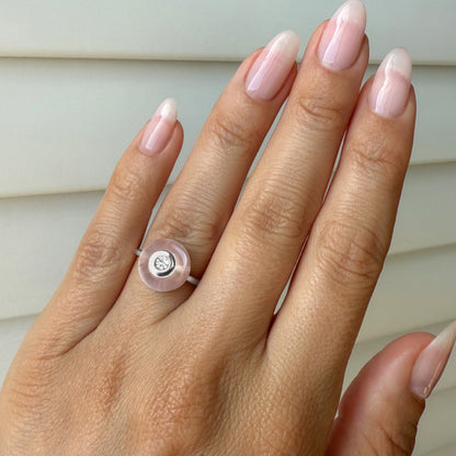 Rose Quartz Fidget Ring - Ora, silver on hand