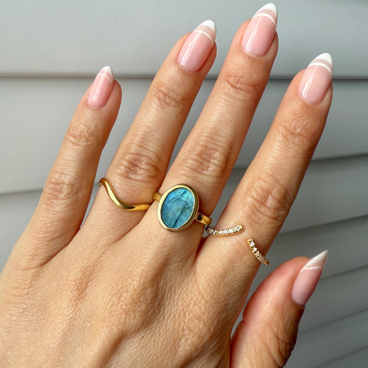 Enfolded Labradorite & Infinite & Waves Rings - gold angle