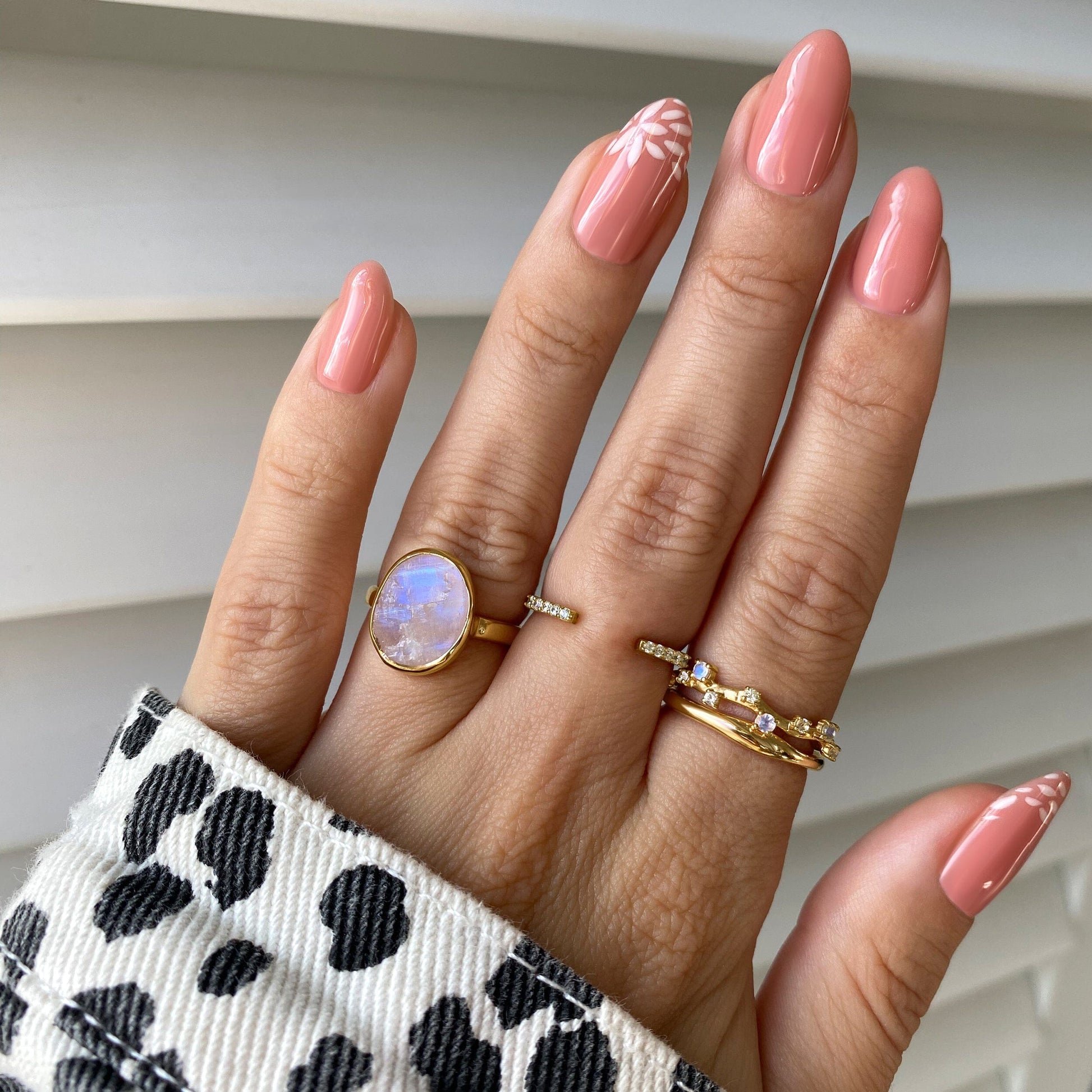 Moonstone Ring - Enfolded - yellow gold worn close-up
