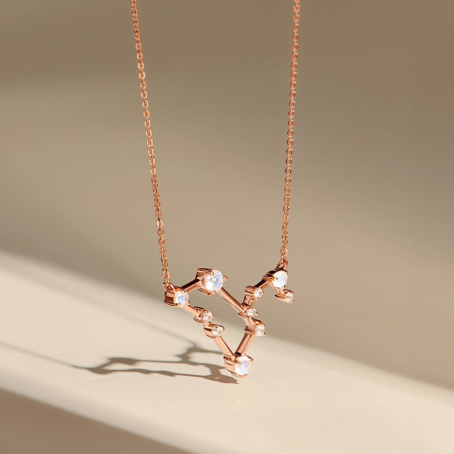 Fine Moonstone Lab Diamond Necklace - Leo Zodiac Constellation - rose gold flatlay