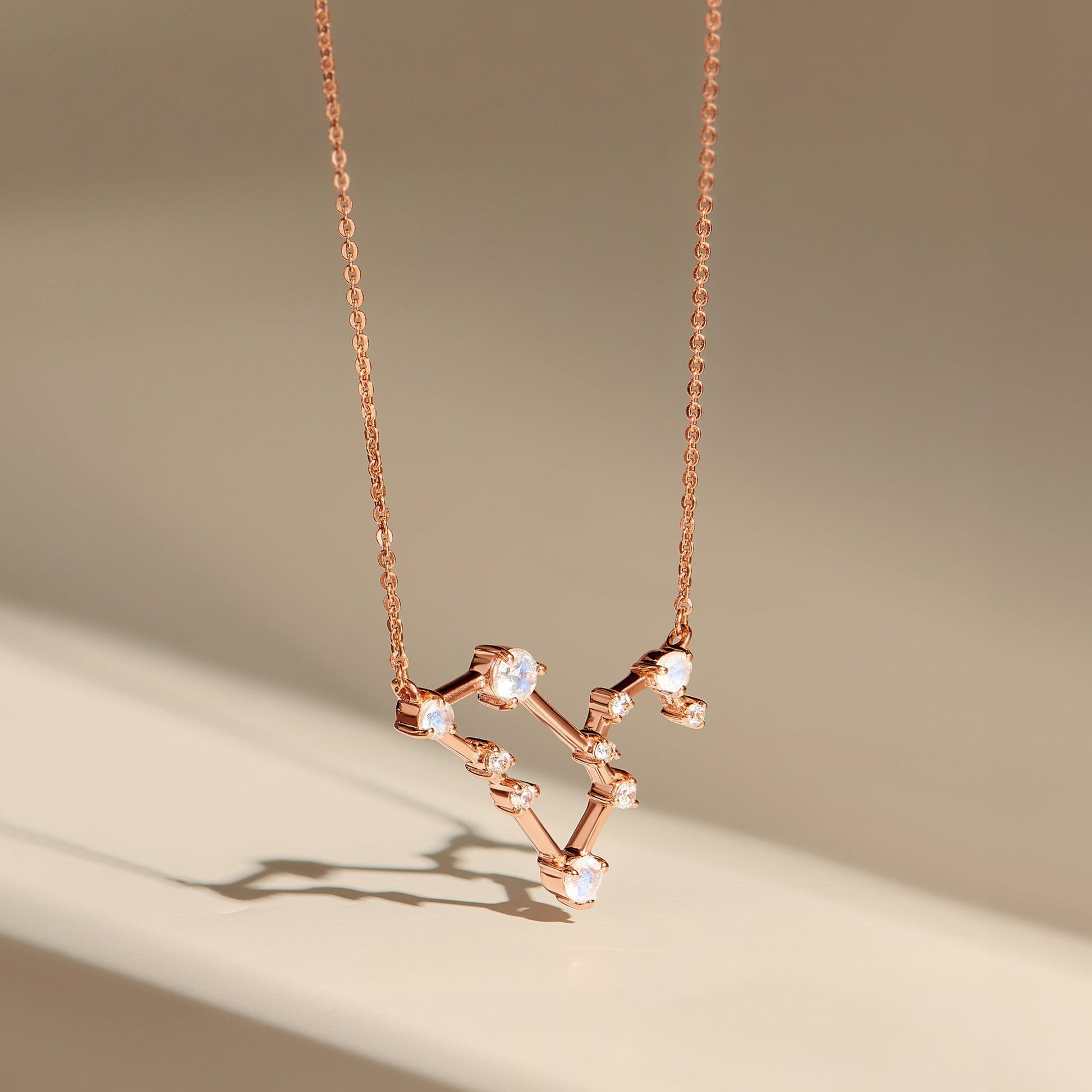 Fine Moonstone Lab Diamond Necklace - Leo Zodiac Constellation - rose gold flatlay