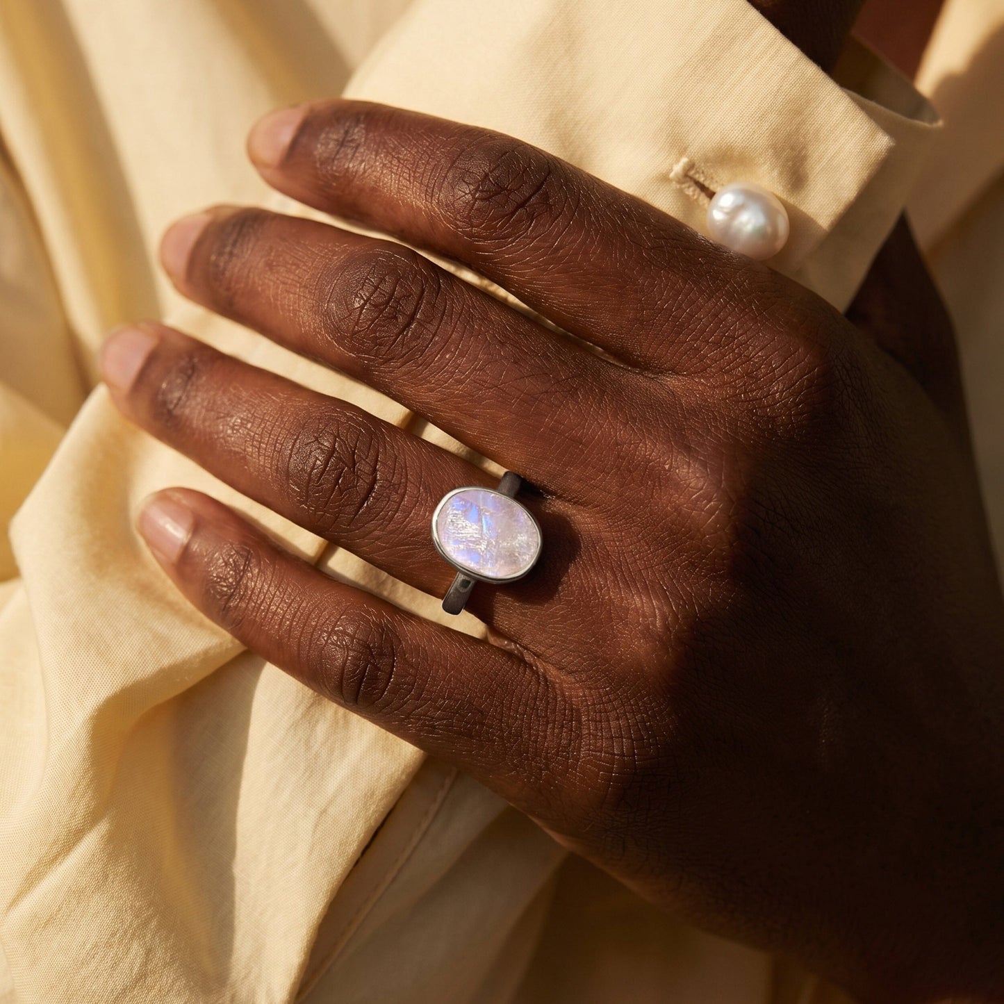 Moonstone Ring - Enfolded - sterling silver on hand