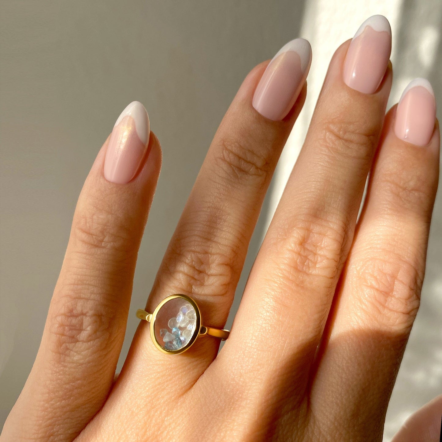 Moonstone Aquamarine Ring - Halo of Calm - yellow gold worn