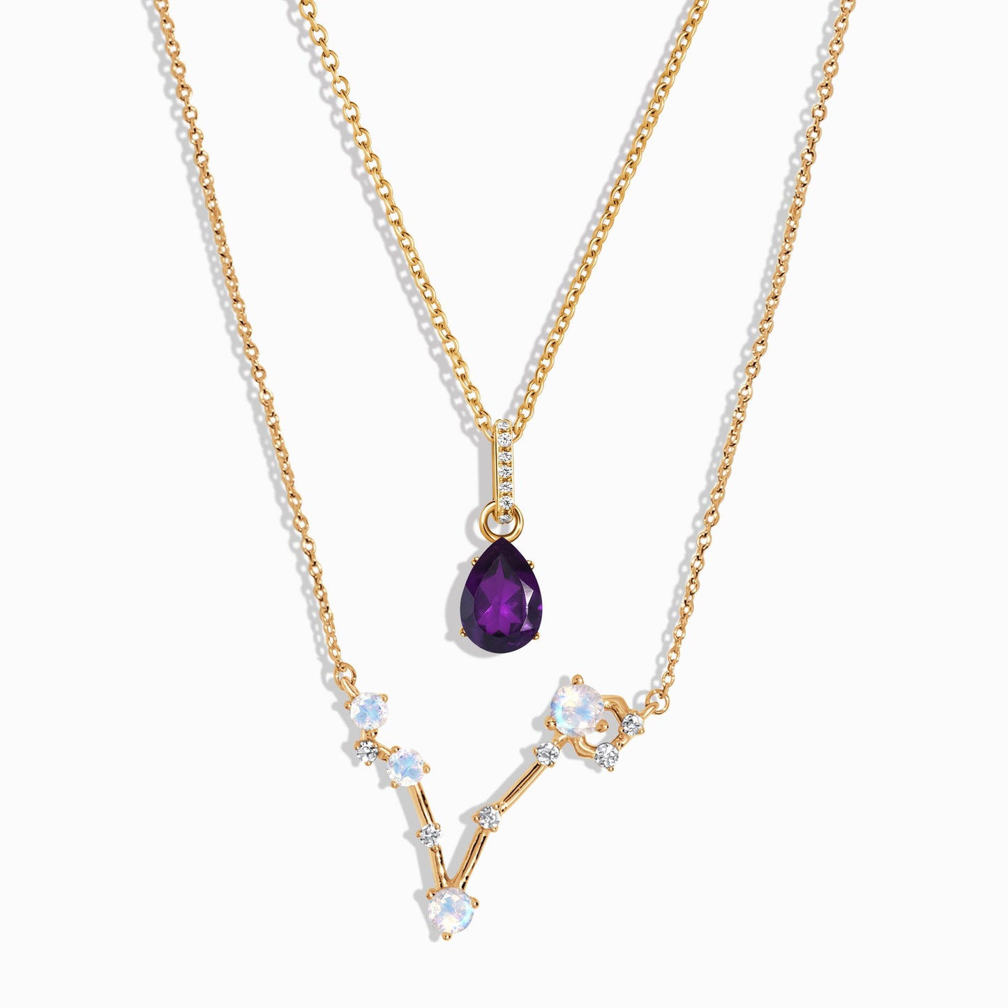 Pisces zodiac and February birthstone necklace set yellow gold studio shot