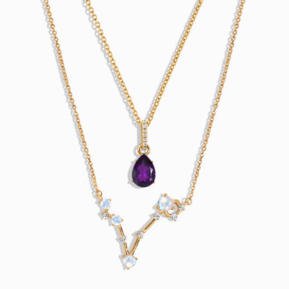 Pisces zodiac and February birthstone necklace set yellow gold studio shot
