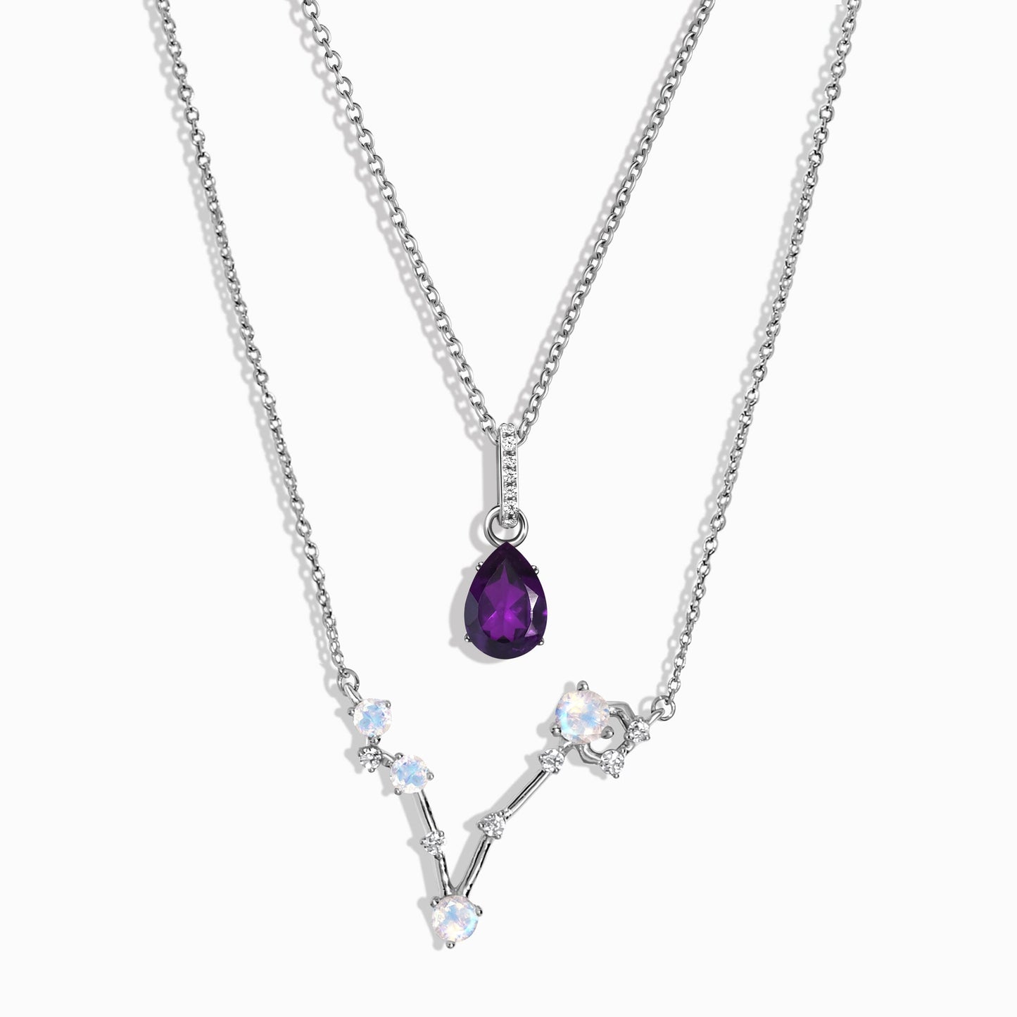 Pisces zodiac and February birthstone necklace set silver studio shot