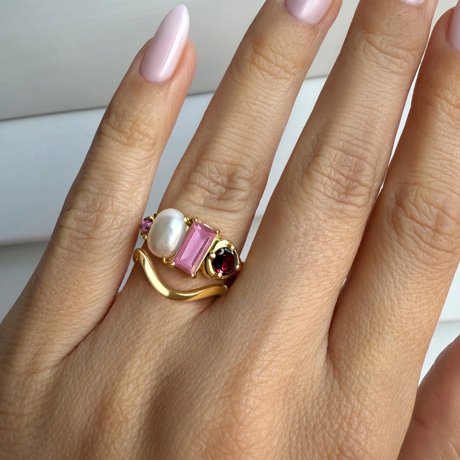 Treasure Waves ring stack yellow gold on hand 2