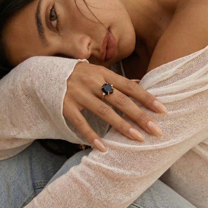 Raw Allure ring yellow gold on hand with face