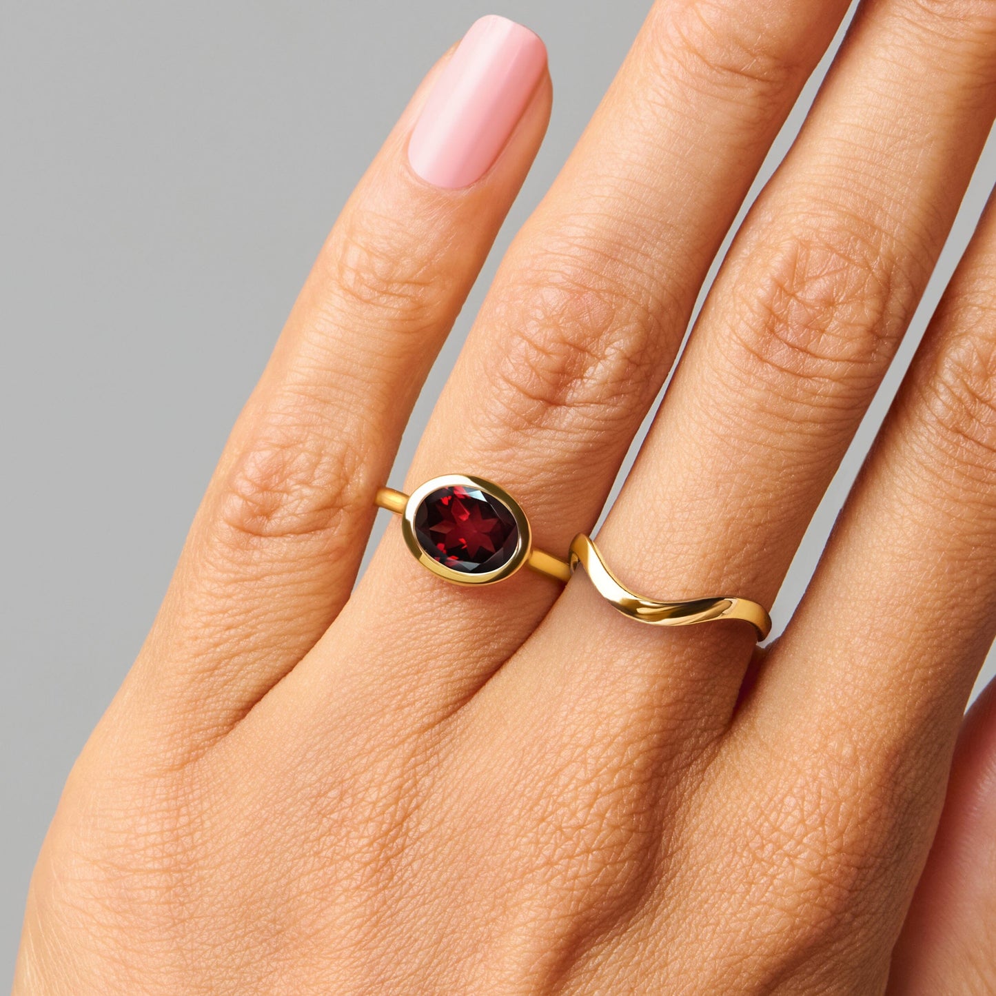 Garnet Skin-Touch & Waves Rings - yellow gold worn