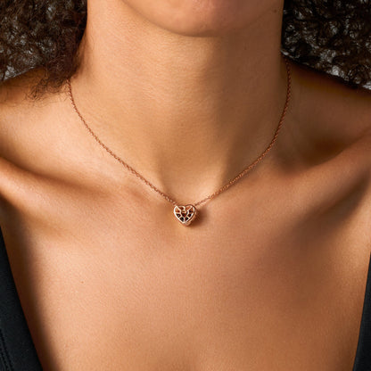 Heart in Motion necklace rose gold on neck
