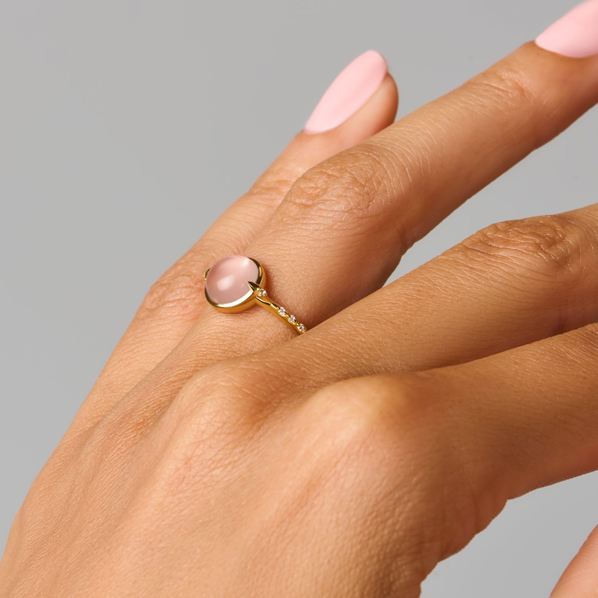 Rose Quartz Energy Ring - Self-Love Engraved, yellow gold lifestyle