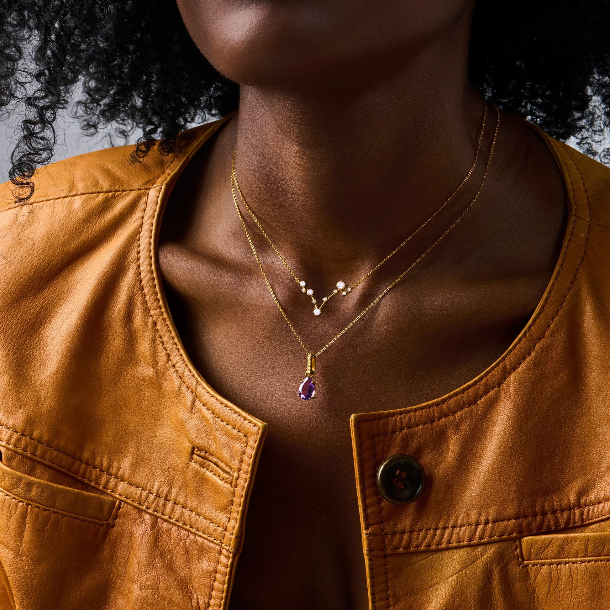 Pisces necklace yellow gold styled