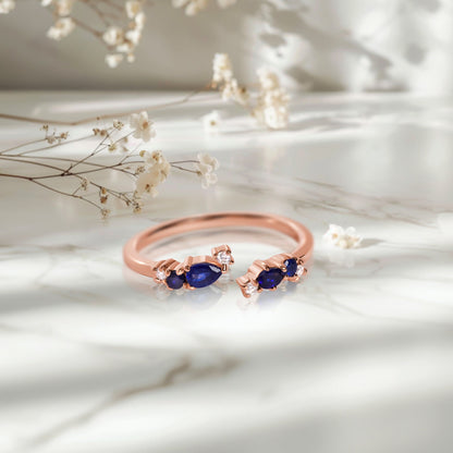 Adjustable Blue Sapphire Ring Flourish - rose gold on marble