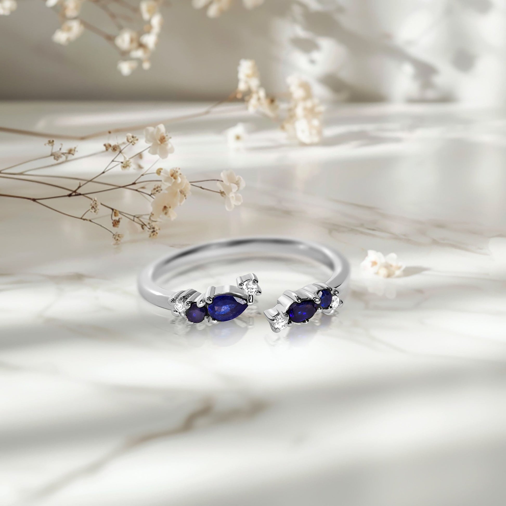 Adjustable Blue Sapphire Ring Flourish - silver on marble
