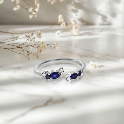 Adjustable Blue Sapphire Ring Flourish - silver on marble