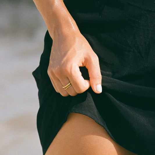 Gemini gold rings worn on hand