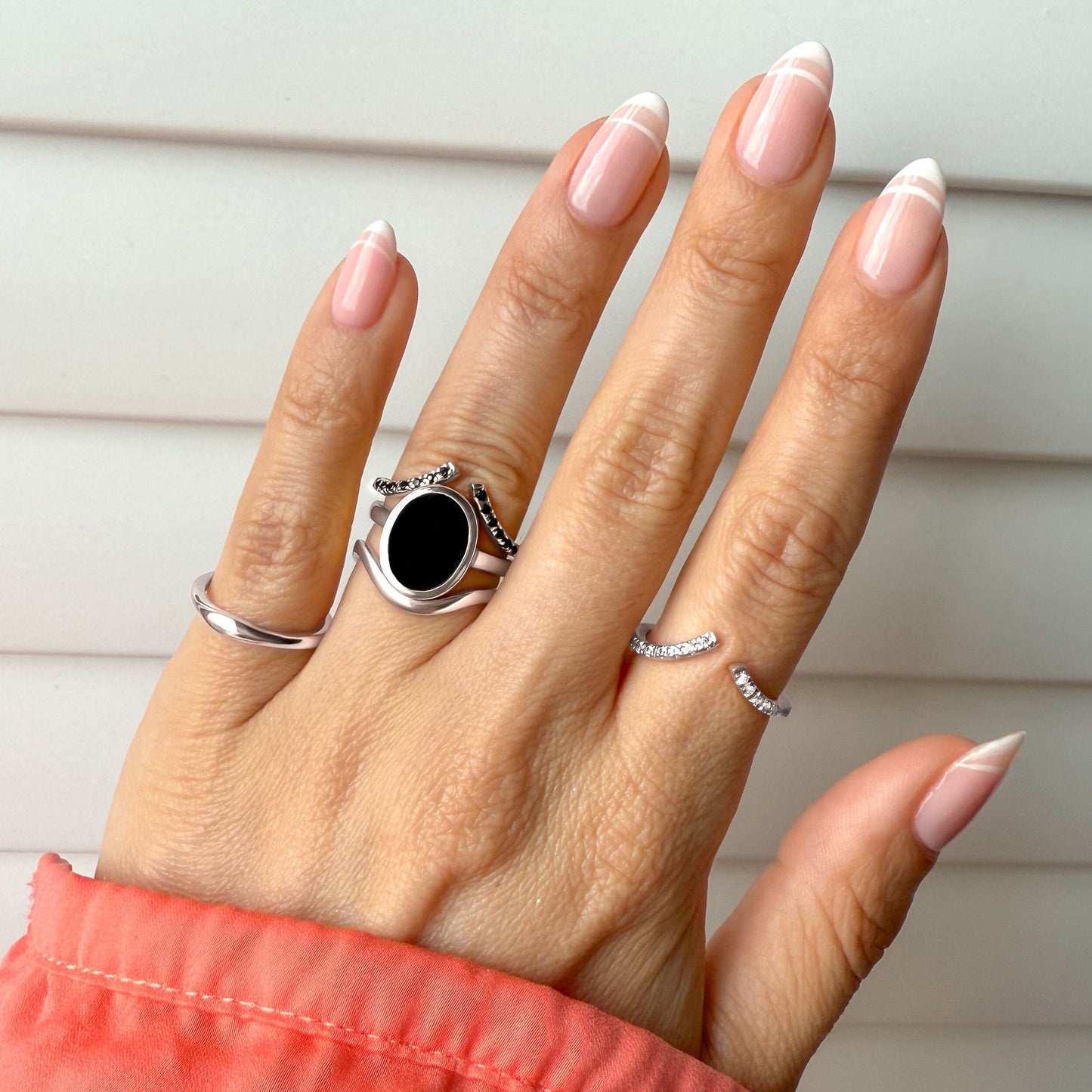 Enfolded Black Onyx & Waves Rings worn