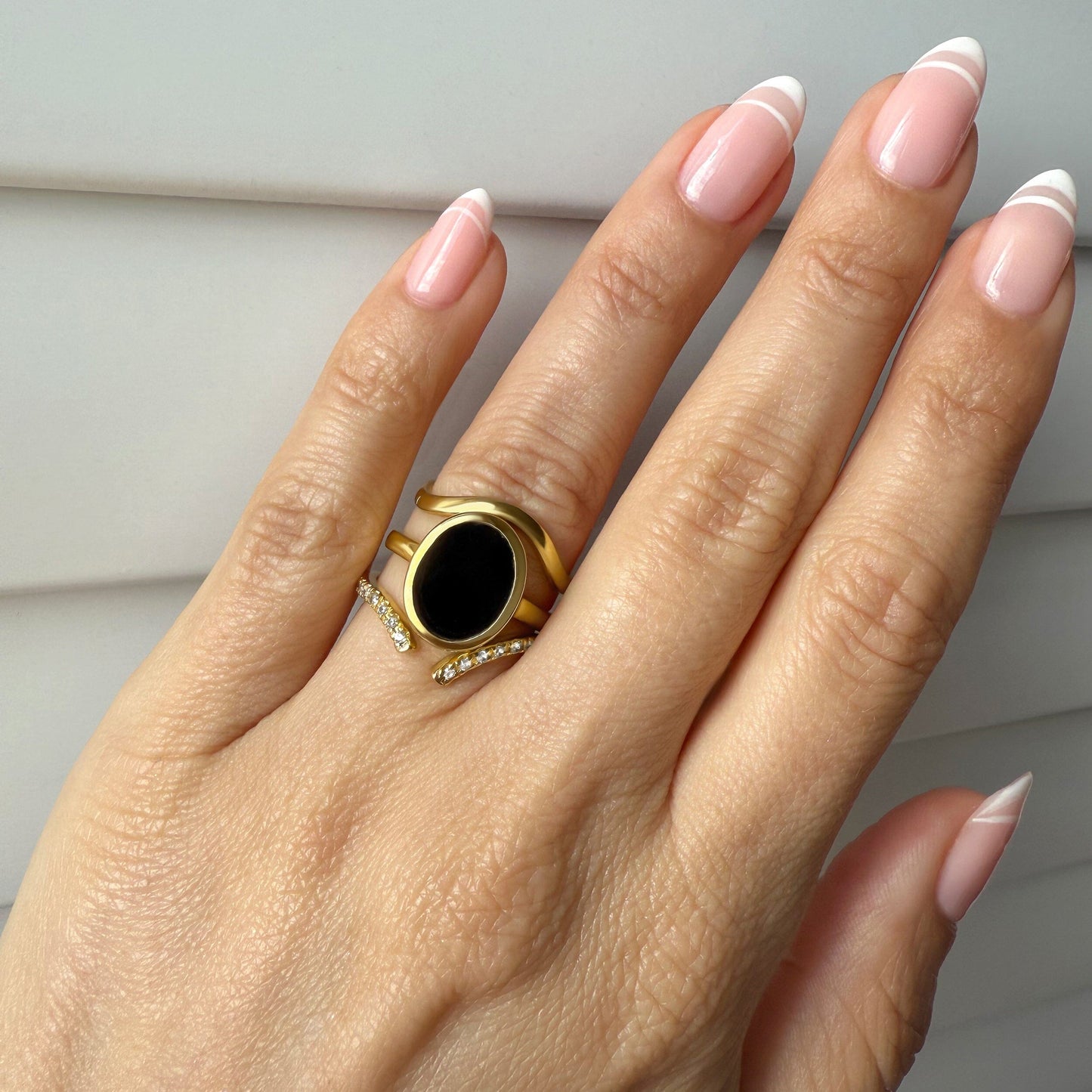 Enfolded Black Onyx & Infinite & Waves Rings - lifestyle yellow gold
