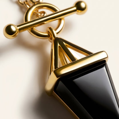 Heroine T-Lock Widelink Necklaces - yellow gold pendant macro