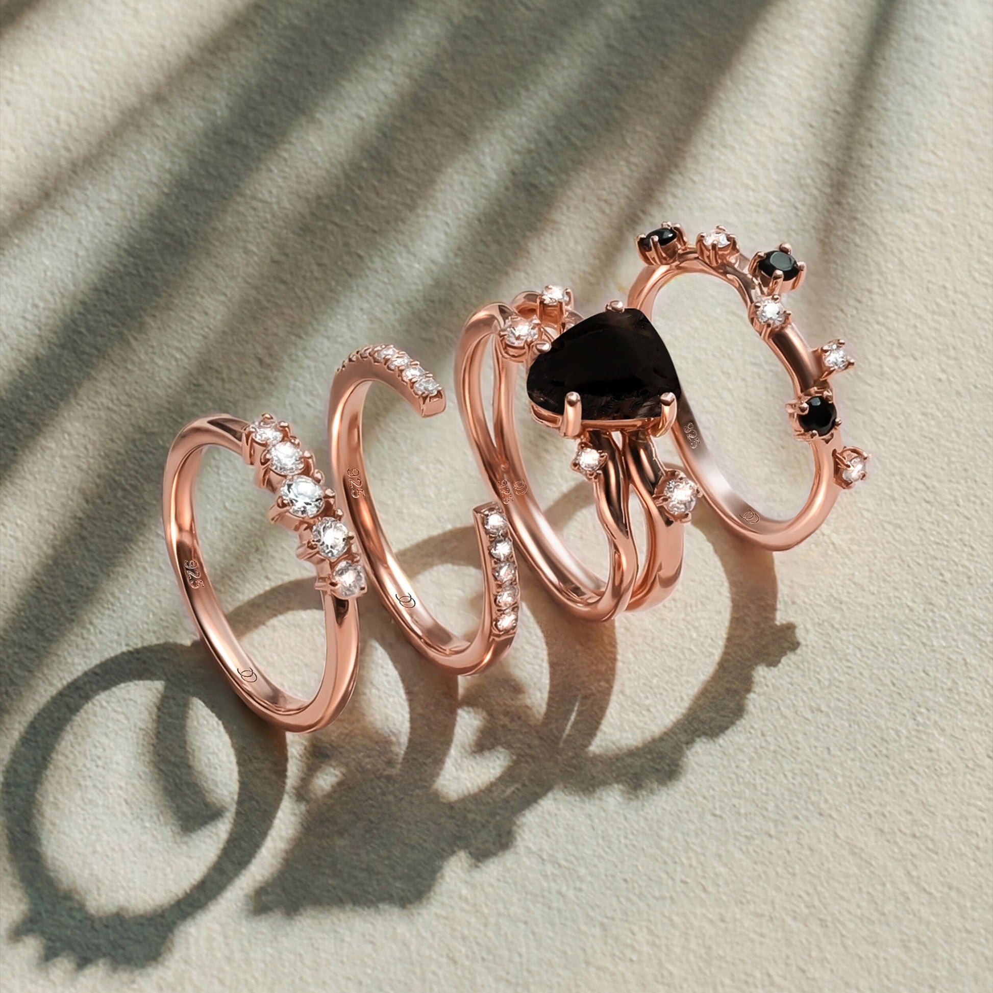 Black Obsidian Flow Stardust Rings - rose gold alt worn
