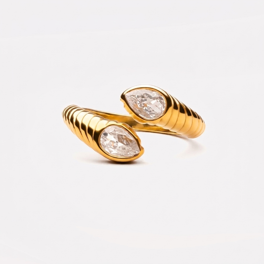 Naya Ring - gold sculptural ring with zircon stones